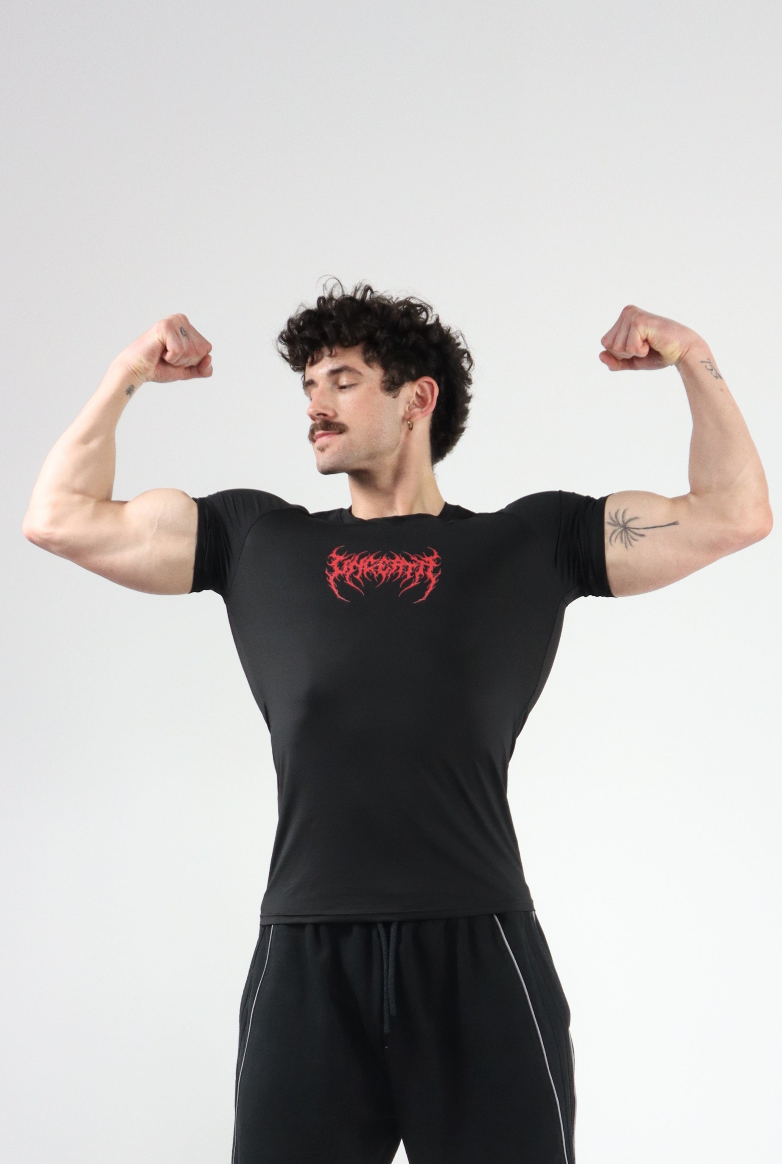 UC036 Celestial Compression Tee - Black/Red